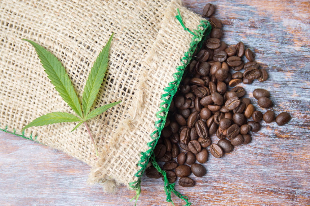 cannabis and coffee beans in a small linen bag